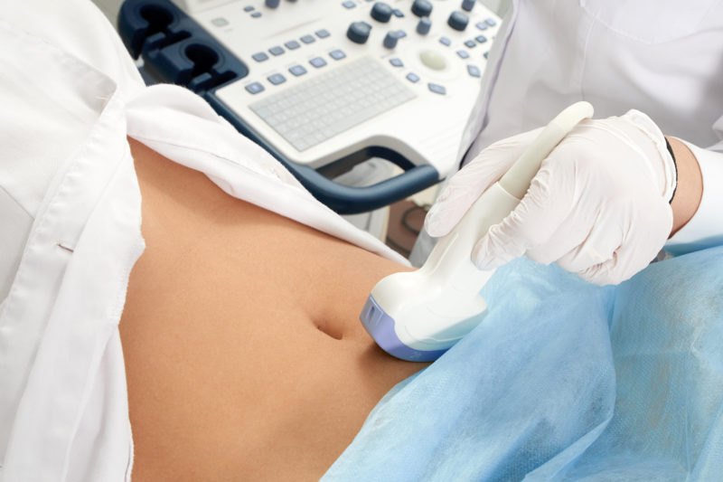 Cropped View of Woman Having Pelvic Ultrasound Scan